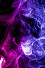 Colored smoke on black background