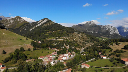 Fototapeta na wymiar Aerial view of Arenas de Cabrales. Las Arenas is one of nine Parish in Cabrales, a municipality within the province and autonomous community of Asturias, in northern Spain.