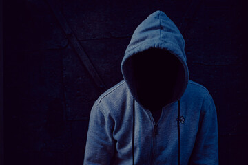 Closeup shot of a man in a hoodie with no visible face