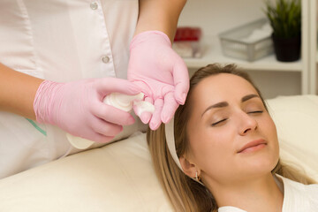 Obraz na płótnie Canvas stage of facial cleansing at a cosmetologist's appointment