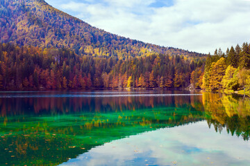 Lake Fuzine. Orange and red trees
