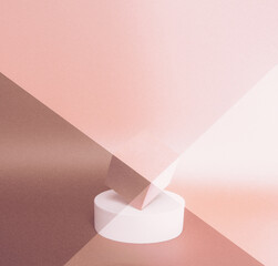 Bright balance of 2 pedestals (cube and round) on a paper background. In pastel pink, with gradient, grain and diagonally toned. Advertising place. Blank product stand with light.