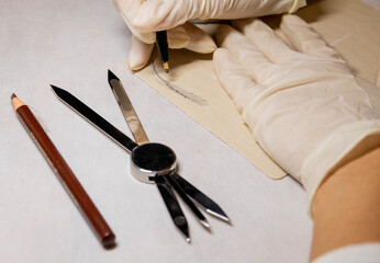 Girl practices permanent makeup microblading