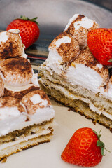Traditional Italian dessert tiramisu with strawberry, selective focus image