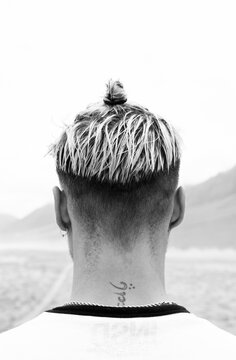 Nape of young man with modern haircut