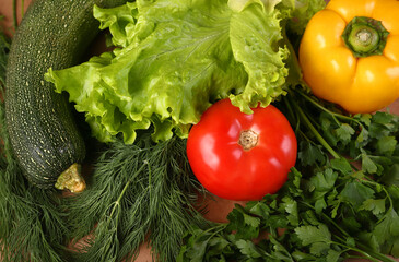 Salad parsley pepper tomato zucchini on craft paper