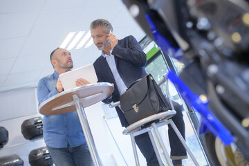 buying motorbike accessories at a shop