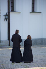 Two ortodox priests in robes on the territory of the Kiev Pechersk Lavra