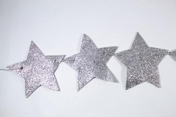 Estrelas com gliter em fundo branco