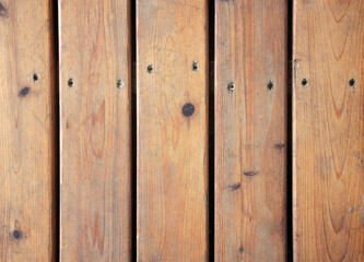Wooden deck boards with screws