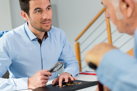 professional jewelry inspector inspecting the material