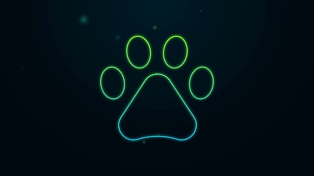 Glowing neon line Paw print icon isolated on black background. Dog or cat paw print. Animal track. 4K Video motion graphic animation