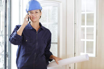woman builder on the phone