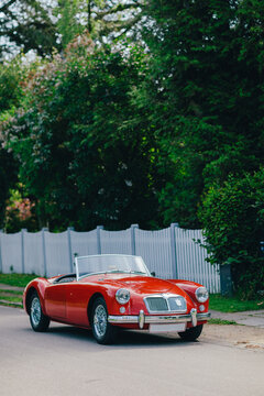 A vintage car parked on the street