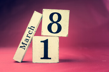 March 18th, Eighteenth of March, Day 18 of month March - vintage wooden calendar blocks on maroon...