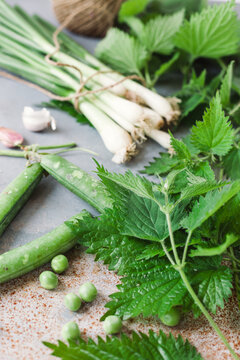 Fresh ingredients for a nettle and pea soup