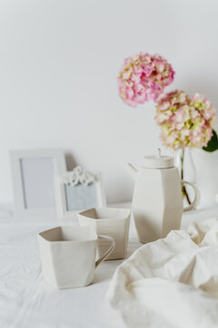 Artistic mugs and teapot