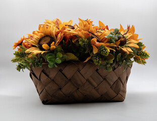 Straw basket with beautiful yellow flowers