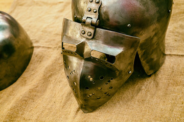 close-up of a medieval iron helmet with a slit for the eyes