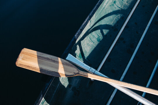 Paddle resting on a canoe