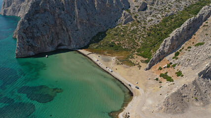 Aerial drone photo of tropical exotic bay with emerald sea and rocky seascape