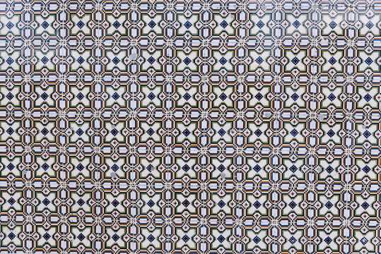 Texture of traditional Portuguese tiles on the wall