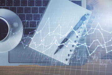 Multi exposure of forex chart drawing and work table top veiw. Concept of financial analysis.