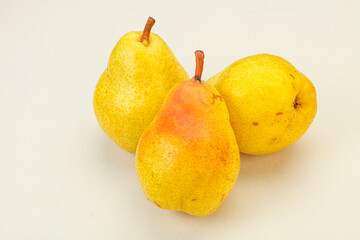 Fresh sweet pear over background