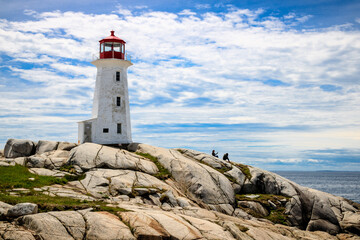 Fototapeta na wymiar Nova Scotia's icon: Peggy's Cove lighthouse during a sunny day