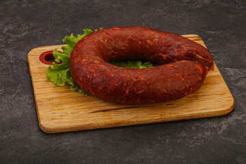 Krakowska sausage over the board