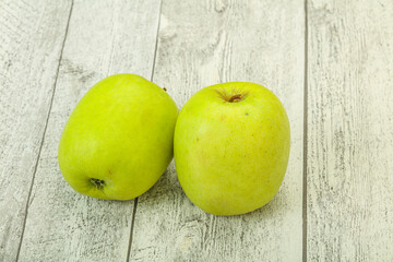 Two ripe green sweet apples