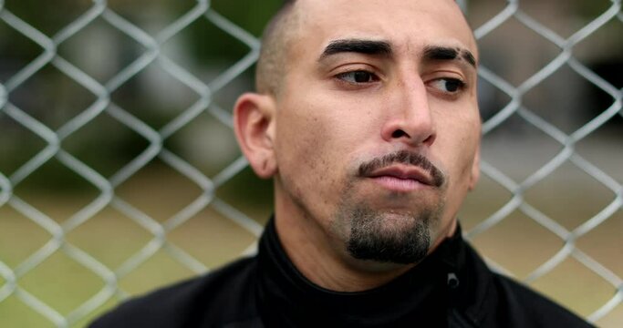 Hispanic man walking forward, south american latin guy serious face