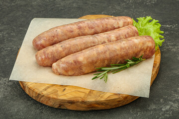 Raw pork meat sausages for grill