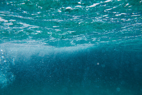 waves from underwater, blue background