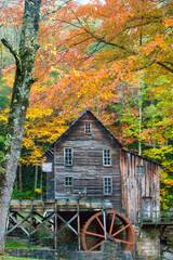 Fototapeta na wymiar grist mill in full fall color