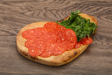 Italian spycy pepperoni sausage slices