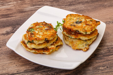 Zucchini pancakes with herbs and spices