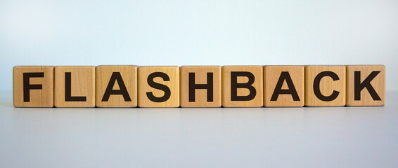 Wooden cubes with word 'flashback'. Beautiful white background. Business and educational concept. Copy space.