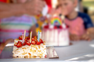 Beautiful cake and birthday of the child. Congratulation. Joy.