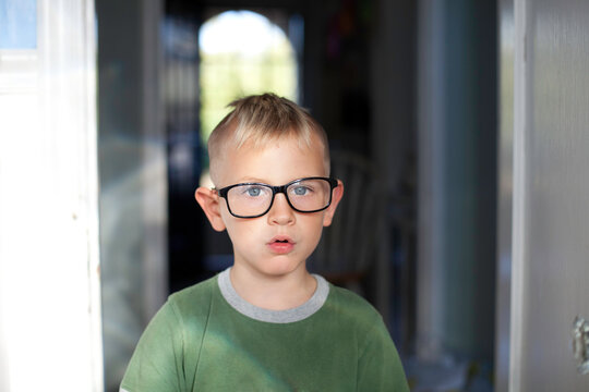 Five year old boy with glasses and mohawk