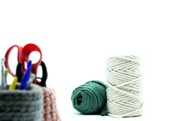 White macrame bobbin and green T-shirt yarn bobbin with macrame cases Pastel pink and another gray color, handmade