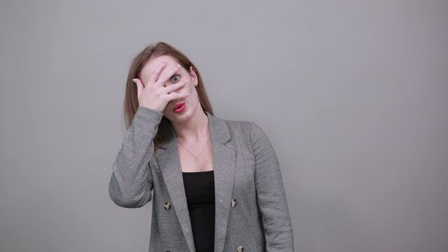 Covering mouth with palm. Can't say anything. Shocked gasping amazed hearing stunning unbelievable news press hand face astonished gossiping found out shocking truth, standing stunned speechless.