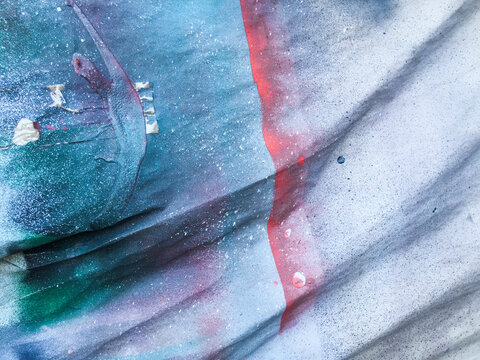 Paint samples and patterns on paper, close up