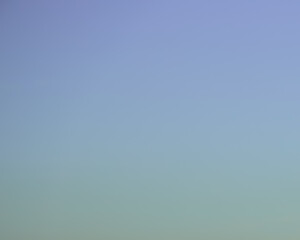 sky background captured in the evening, sky view in  natural colors with gradient, sky texture without clouds, atmosphere and space colors, defocus