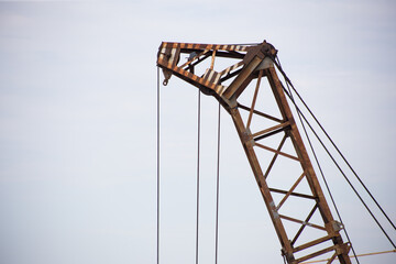 Tower crane at a construction site in the city
