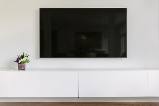Television in Contemporary Family Room in Home