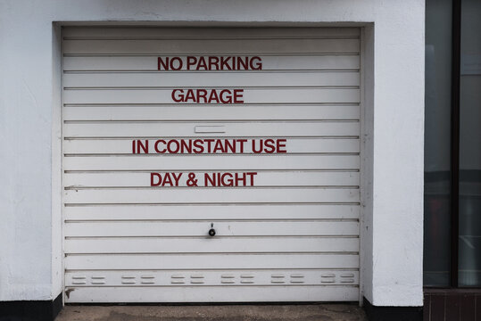 No parking sign on a garage door