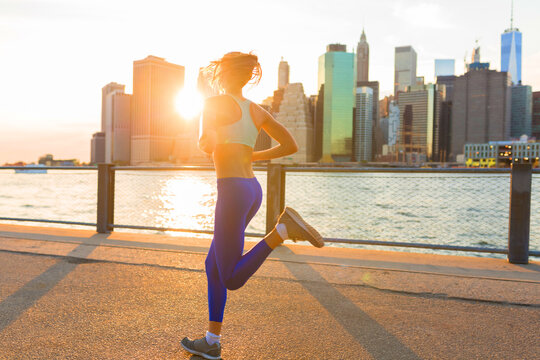 Beautiful Woman Runnign in Brooklyn at the Sunset