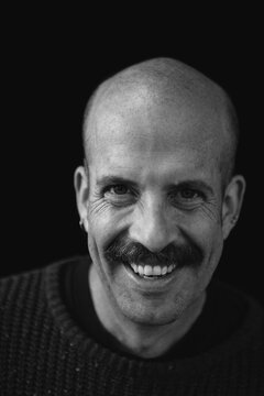 Portrait of smiling bald man