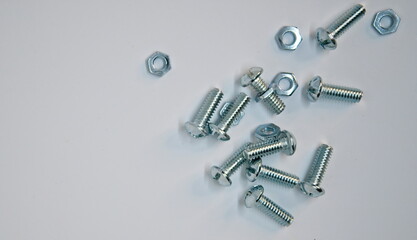 Overhead View of Some Shiny Nuts and Bolts
